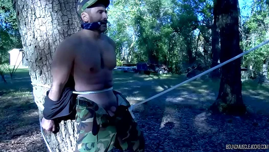 Tyler Duke Goes Wild: BDSM in the Woods – Chained Muscle Studs Exposed
