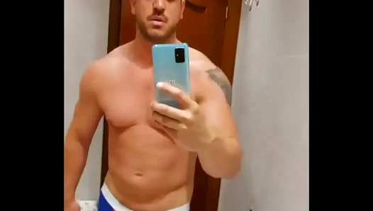 David Cork Bares His Massive Cock in Hot Bareback Glory Hole Action – 18+