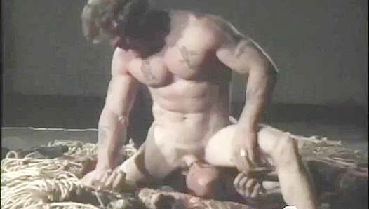 Oil-Slick Muscle Twink Devours Huge Cock in Steamy Warehouse Fuck Fest – Falcon Studios