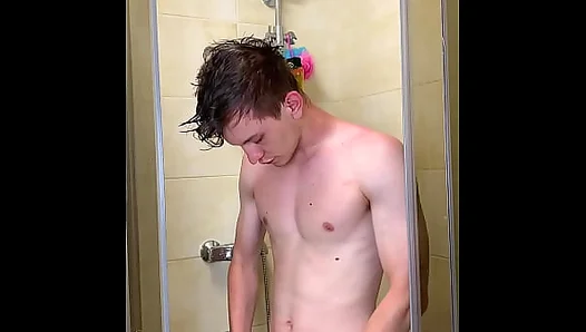 Slim Teen Soaks Under Steamy Spray, Flashing His Fat Uncut Cock –