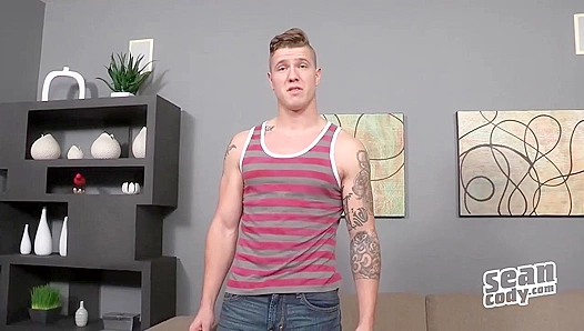 Tattooed Stud Fucks Himself Hard on Couch – Exclusive SeanCody